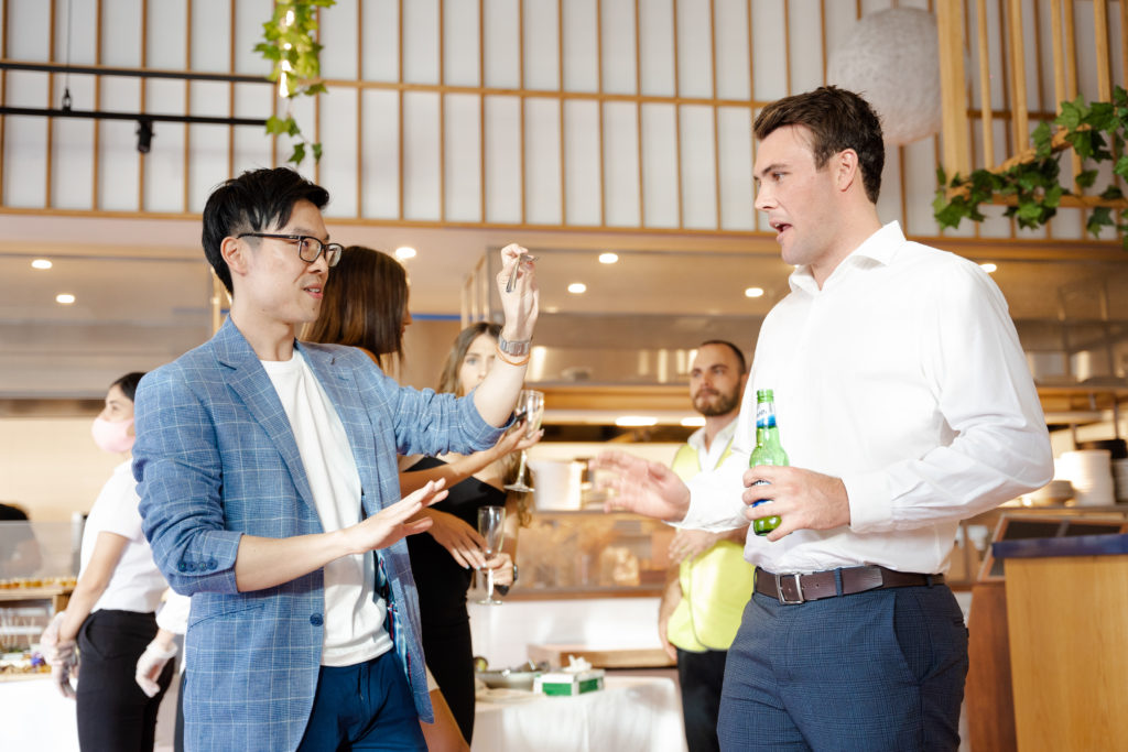 Sydney magician Ronald Chow performing at corporate event